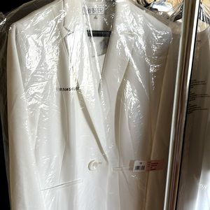 Suit: includes dress and blazer Color is White Ice